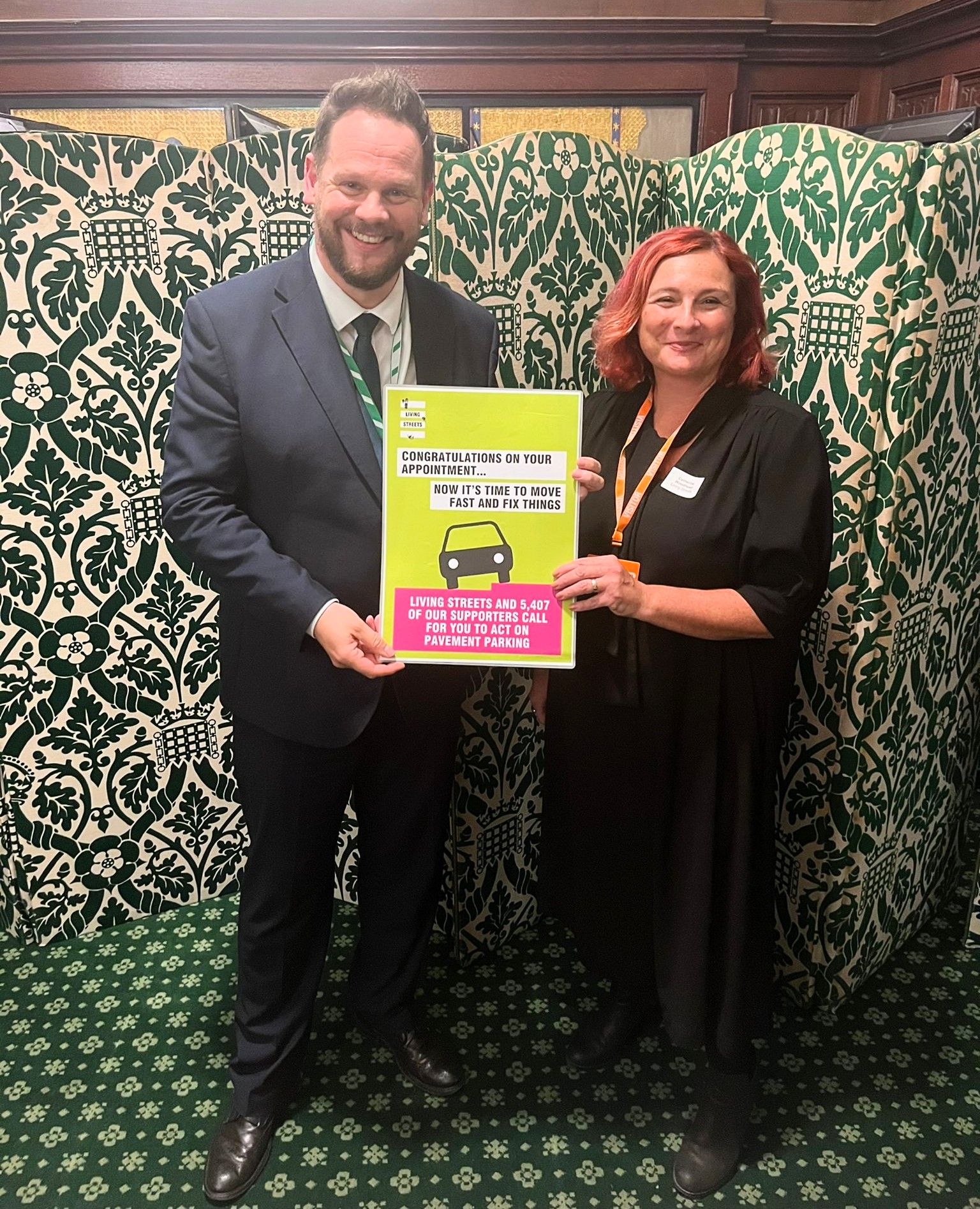 Simon Lightwood MP and Catherine Woodhead pose with a greeting card