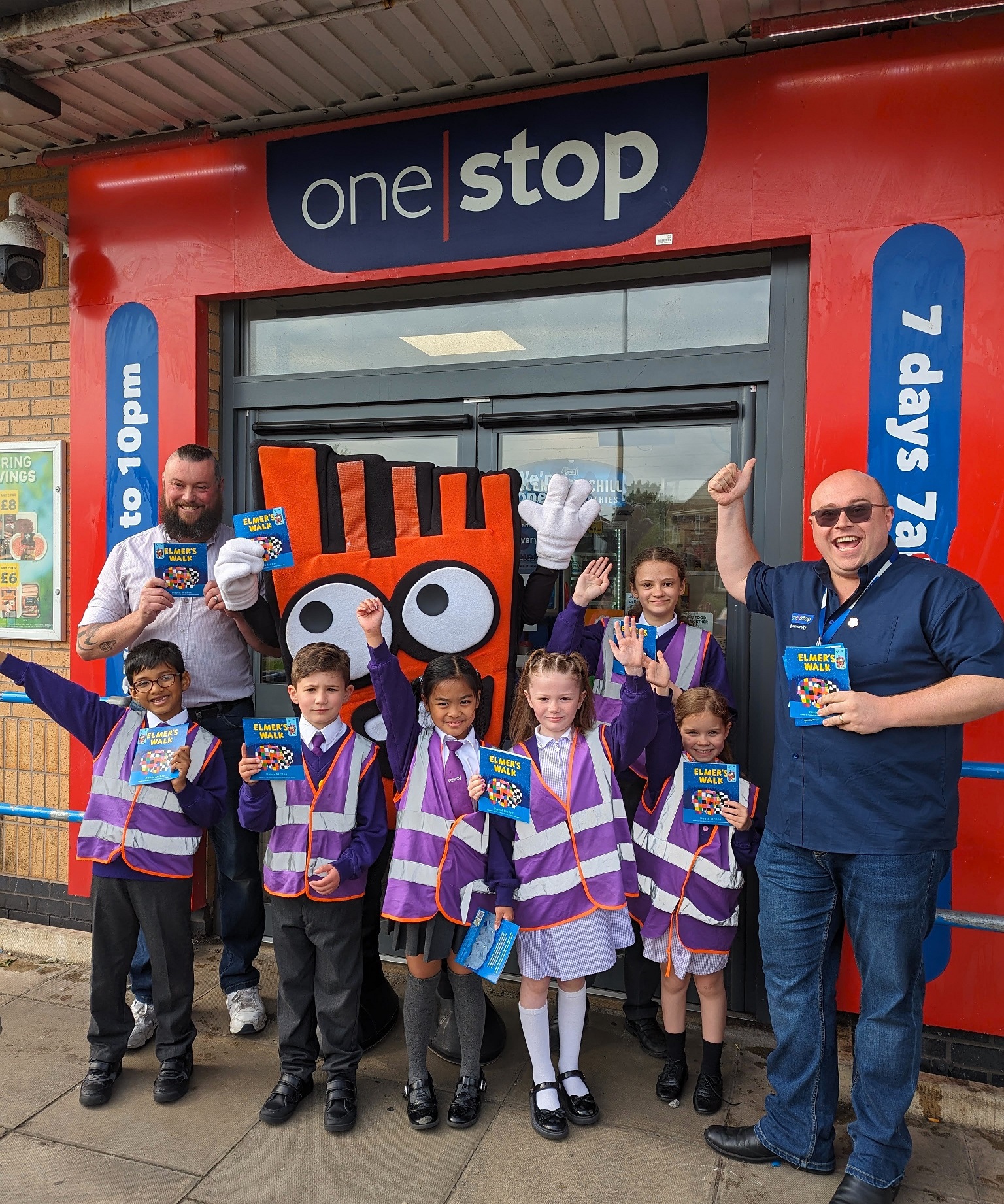 Pupils from Boundary Primary School outside a One Stop store in Blackpool